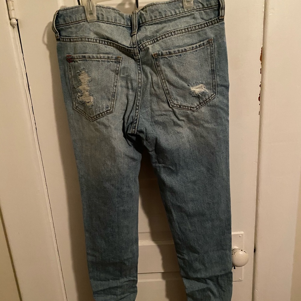 Distressed straight jeans